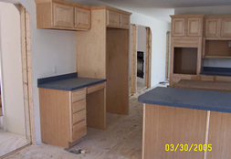 VIEW OF KITCHEN AND MATING WALL DOOR OPENINGS. DOOR OPENINGS NEED TO BE COMPLETED ON-SITE AFTER SET.