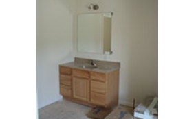 BATHROOM VANITY WITH TYPICAL MIRROR